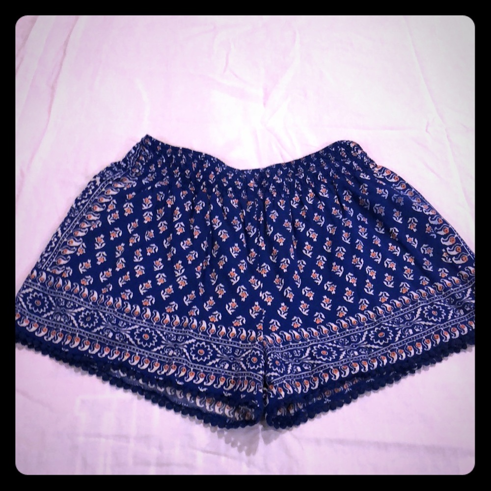Adorable blue shorts with cute leg trim.